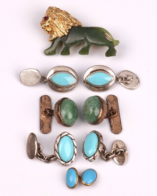 Two pairs of silver and turquoise cufflinks, a pair of gilt metal cufflinks set oval cabochon green hardstones together with a Swoboda gilt metal and green hardstone brooch in the form of a lion 4cm 