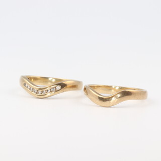 A 9ct gold wishbone engagement ring set 10 diamonds together with a matching wedding band, size I 1/2, 3.4 grams 