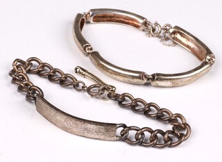A silver curb link identity bracelet and 1 other, 56 grams 