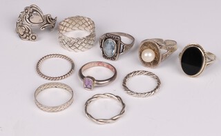 Ten silver dress rings, 25.15 grams gross 