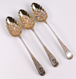 A set of 3 Georgian silver berry spoons with embossed and parcel gilt bowls, Exeter 1804 by William Welch II, 198 grams 