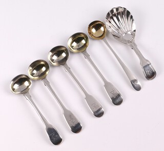 A Victorian silver fiddle and thread pattern caddy spoon, London 1856 by George Aldwinckle, 3 Victorian silver fiddle pattern mustard spoons with armorial decoration London 1842 by Morris Cadman and 2 other silver mustard spoons 78 grams