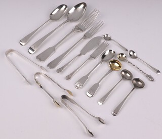 A Victorian silver butter knife together with matching fork, Sheffield 1893, a Georgian silver fork, a Victorian silver Old English pattern fork, a Georgian silver spoon, 2 silver sugar tongs and other condiments spoons, etc, 287 grams 
