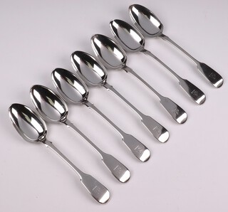 A set of 7 Victorian fiddle pattern table spoons with armorial decoration London 1840 by John and Henry Lias, 528 grams 