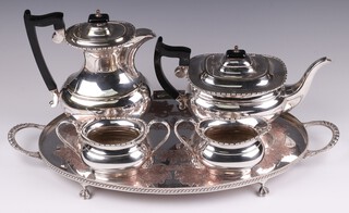 A Viners silver plated 4 piece tea service with teapot, hot water jug, sugar bowl and milk jug, together with an oval plated twin handled tea tray  