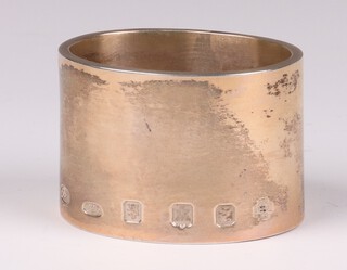 A heavy plain silver napkin ring Edinburgh 1999 with millennium hallmark by Christian St John, 169 grams 