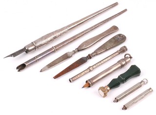 A silver propelling pencil London 1918 by Sampson Morden, 2 silver handled manicure implements, 2 silver dip pens Birmingham 1909 and 1911 (dented), together with 2 propelling pencils and a hardstone seal 
