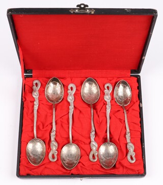 Six silver teaspoons marked Nagasaki, in a plus case, 90 grams 