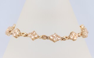 A 9ct yellow gold bracelet set moonstones, 19cm, 11.4 grams 