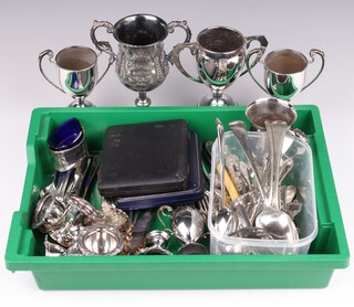 A set of silver plated 6 bean end coffee spoons, a set of 6 gold plated coffee spoons (both cased), a silver plated tankard, 4 Victorian silver plated egg cups, 4 plated twin handled trophy cups and a collection of flatware 