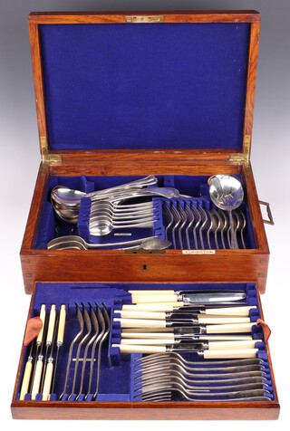 A 38 piece canteen of Elkington silver plated Old English pattern flatware comprising 12 dinner forks, 5 table spoons, 6 dessert forks, 6 dessert knives, 2 sauce ladles, soup ladle, 6 tea spoons together with 6 associated tea knives, 12 dinner knives, 6 soup spoons, 3 serving spoons, jam spoon, sugar tongs, 3 tea knives, salt and pepper, condiment spoon, all contained in an oak canteen box 