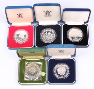 The first five sterling silver proof Crown coins issued by Queen Elizabeth II (each encapsulated, with it's own case)comprising Silver Wedding anniversary 1972 (LL1), Silver Jubilee 1977 (LL2), Queen Mother's 80th Birthday 1980 (LL3), Wedding of Charles and Diana 1981 (LL4) and Queen Mother's 90th Birthday 1990 (LL5), total coin weight 141.4g