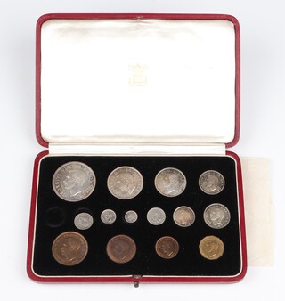 A set of  1937 George VI specimen coins, in original fitted red leather and gilt case with royal cypher, gilt lettering  