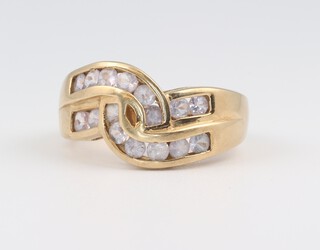 A 9ct yellow gold ring set 2 rows of 16 cubic zirconia, size N, 4.6 grams