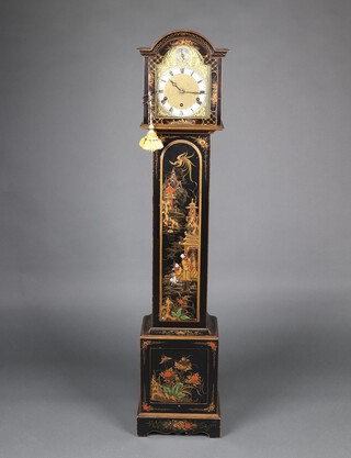 Hamberg American Clock Company, a 1920's chiming granddaughter clock with 17cm arched dial, silvered chapter ring, contained in a black lacquered chinoiserie style case decorated figures, on bracket feet 132cm h x 27cm w x 19cm d, complete with pendulum and key 