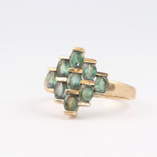 A 9ct yellow gold topaz and diamond cluster ring, size N, 3.6 grams 