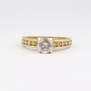 A 9ct yellow gold ring set moisannites, size N, 2.9 grams