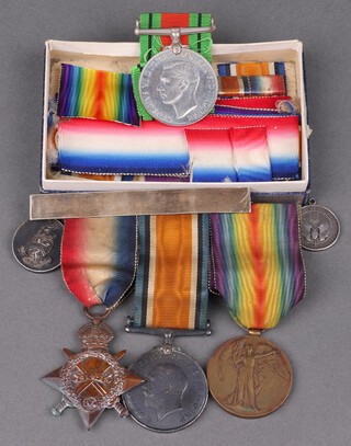 A group of 3 medals to Gunner 13711 AG Andersen Royal Marine Artillery comprising 1914-15 Star, British War medal and Victory medal, mounted for wear, together with a silver Jutland commemorative medal, Second World War Defence medal and various medal ribbons