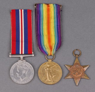 A Victory medal to 28367 Sergeant D T Jones Machine Gun Corps, together with a 1939-45 Star and a Second World War British War medal 