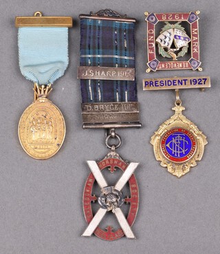 A silver gilt and enamel Horsham Caledonian Reel Class Society medal, a silver gilt and enamel Masonic 1928 Mark Benevolent Fund jewel, a Quatuor Coronati Lodge jewel and a silver gilt and enamelled National Federation of Credit Traders Past President's jewel 1927, 50 grams gross  