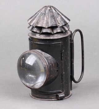 A bullseye hand lantern complete with burner (lens cracked) 17cm 