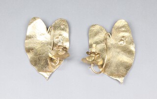 A pair of Art Nouveau Continental brass girandole in the form of lily pads with frogs, converted to electricity, reverse marked RD17801, 37cm x 18cm 