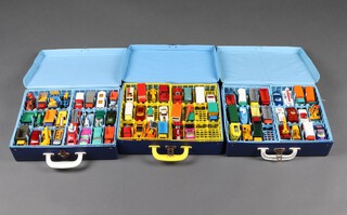 Matchbox Toys a collection of 3 Matchbox collector's cases all partially full with vehicles 