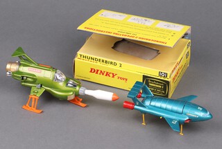 A Dinky Toys Thunderbird 2 and 4 no. 101 boxed with insert tray together with a Dinky Toys 351 UFO Shado Interceptor (unboxed) 