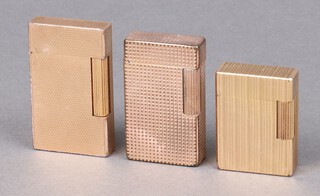Three Dupont gold plated lighters 