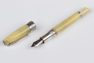 A Montegrappa Italian fountain pen, the nib marked 1912, contained in a marble effect and silver mounted case 
