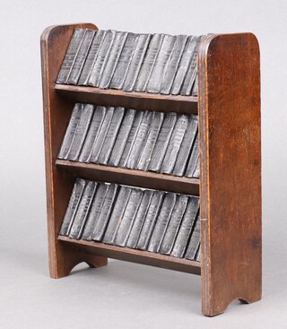 Dickens Charles, A Collected Works pub. Allied Newspapers, a collection of 40 miniature volumes of the works of Dickens, contained in a fitted bookcase 