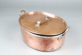 A 19th Century oval copper twin handled fish kettle complete with liner 23cm h x 64cm w x 46cm d