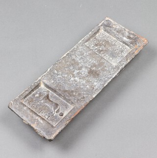 A rectangular tin ingot, removed from the shipwreck of the Steamship Cheerful, which sank on the 20th July 1885 5cm h x 15cm w x 37cm l