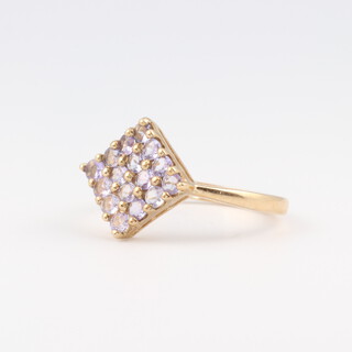 A 9ct yellow gold amethyst cluster ring, size M 1/2, 2.3 grams 