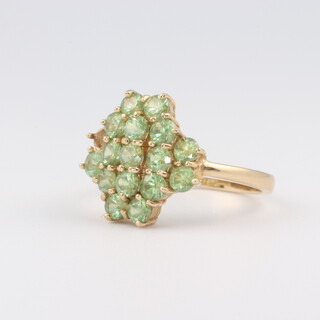 A 9ct gold peridot cluster ring (1 stone missing), size N, 3.4 grams 