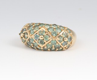 A 9ct yellow gold topaz and aquamarine cluster ring, size N 1/2, 5.3 grams 