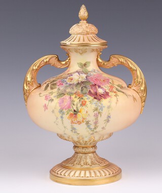 A Royal Worcester blush ivory ground twin handled urn and cover with floral decoration, the base marked 2032, 30cm h