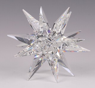 A Swarovski Crystal candle holder in the form of a star 11cm