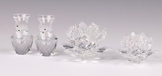 A Swarovski Crystal candle holder in the form of a flower head 5cm (1 petal missing), ditto 4cm and 2 club shaped vases decorated flower heads 7cm 