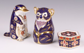 A Royal Crown Derby Imari pattern paperweight in the form of a duck billed platypus LII with gold stopper 11cm, ditto koala bear LI with gold stopper 11cm and a hexagonal jar and cover A.1297 4cm 