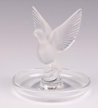 A Lalique circular pin tray/ring tray decorated a dove, 9cm 