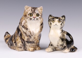 A Jenny Winstanley pottery figure of a seated cat, base signed and numbered 1 11cm and 1 other, base signed no.2  14cm 