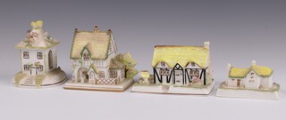 Four Coalport models of cottages - Rustic Cottage, Elizabethan Cottage, The Summer House and The Master's House 