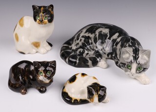 Four Mike Hinton pottery figures - reclining cat 32cm base marked 16, seated cat no.37 20cm, seated cat no.30 15cm and cat no.20 14cm 