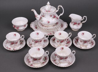 A 22 pieces Royal Albert Lavender Rose pattern tea service comprising teapot, milk jug, sugar bowl, bread plate, 6 tea plates, 6 cups (1 cracked), 6 saucers 