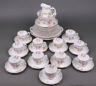 A 36 piece KPM porcelain tea service with floral decoration, bases impressed 485, comprising sugar bowl, milk jug, 2 bread plates, 10 tea plates, 11 cups and 11 saucers 