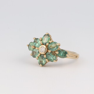 A 9ct yellow gold colour enhanced alexandrite and diamond cluster ring, size N, 4.3 grams (with certificate) 