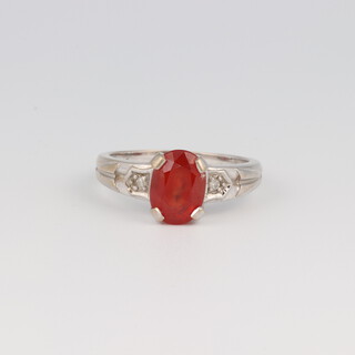 An 18ct white gold padparadscha sapphire, size N 1/2, 5 grams (with certificate) 