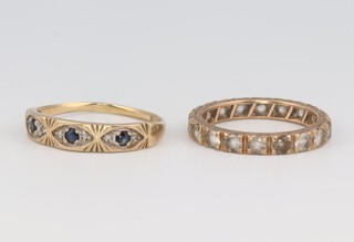 A 9ct yellow gold paste set eternity ring, size L  and a 9ct yellow gold paste set half eternity ring (misshapen) size P, 3.8 grams gross 