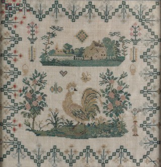 A 19th century sampler with a landscape above a central panel of a rooster between flowering shrubs, enclosed in a floral border, 31cm x 30cm, within a stained wood frame.